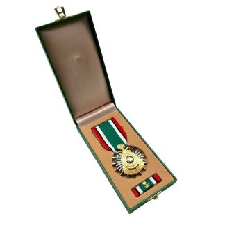Original Kuwait Liberation Medal issued by Saudi Arabia in the original green presentation case.