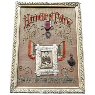 Original WW1 French military commemorative display with medals