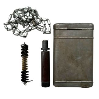 Original German Mauser K98 cleaning kit dated 1937 with G.Appel marking, metal storage tin, cleaning chain and brush.