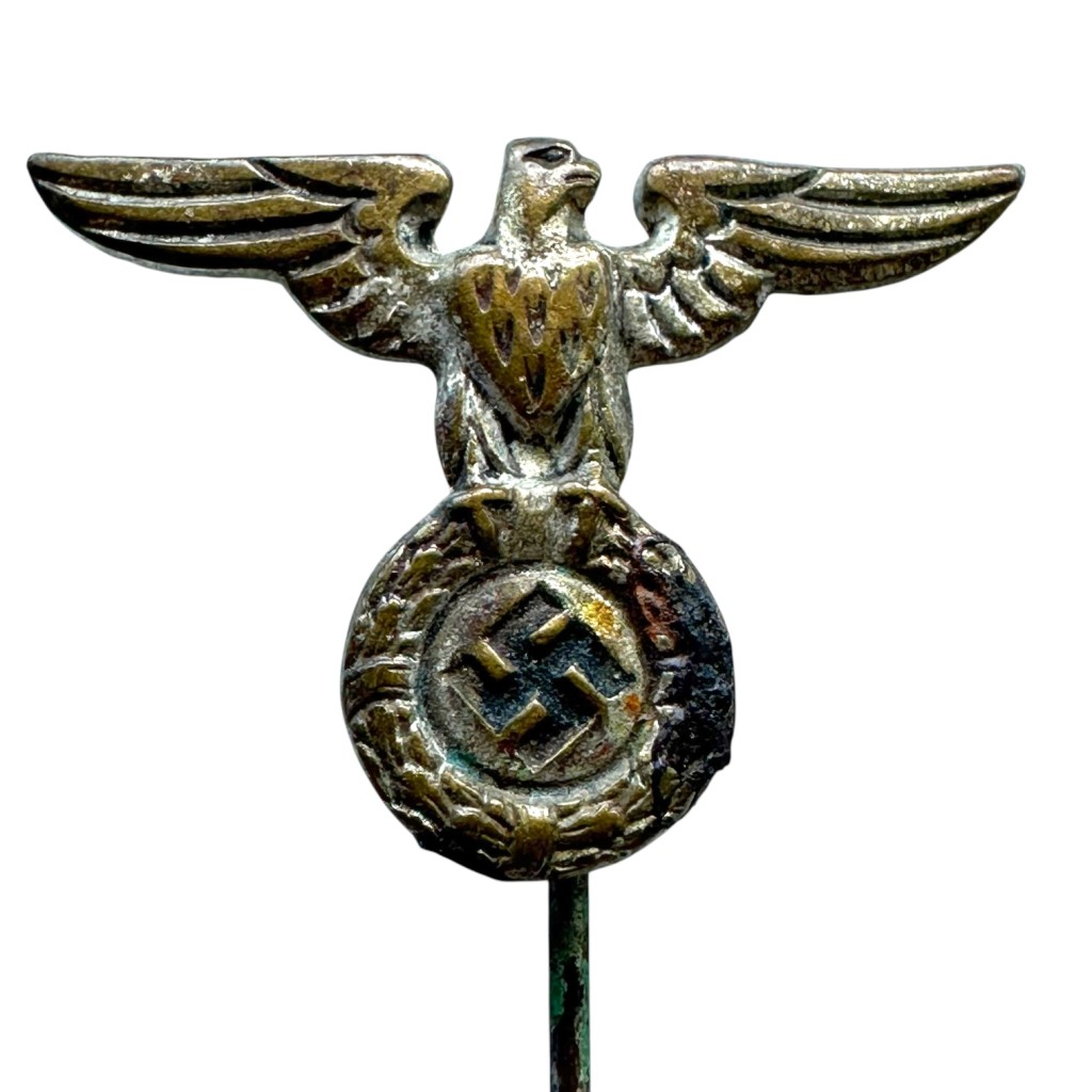 Original WWII German NSDAP tie pin with eagle and swastika from 1933-1945 for collectors of German militaria and insignia.