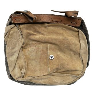 Original WWII Swiss Army bread bag dated 1944 with canvas and leather straps military collectible field gear.