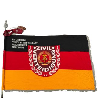 Original DDR Cold War era large Zivilverteidigung flag on pole with top and cover