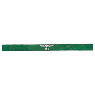 Original WWII German Zollgrenzschutz green cuff title with machine embroidered silver eagle and swastika uniform insignia