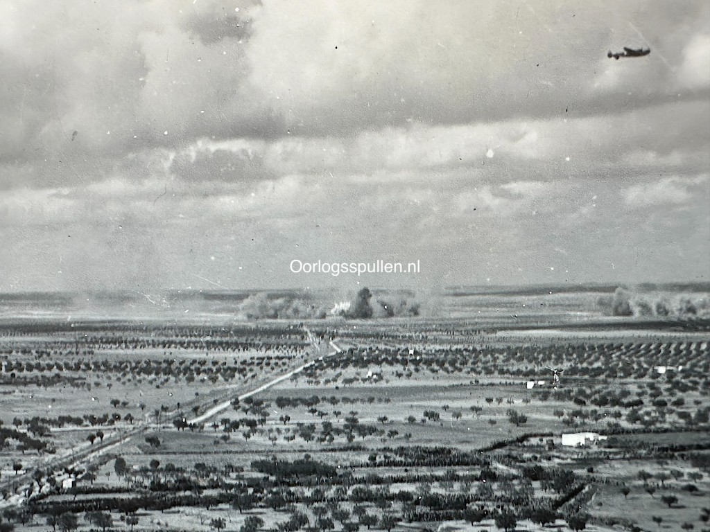 Original WWII collection of Allied aerial reconnaissance photographs featuring bombing missions, reconnaissance flights and target analysis over Italy