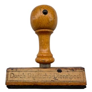 Original WWII German 'Durch Deutsche Dienstpost' rubber postal stamp with wooden handle for collectors of German postal history.