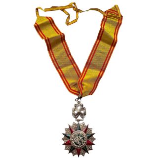 Original Tunisian Nichan Iftikhar Commander’s Cross with enamelled star and neck ribbon from the Beylik of Tunis and French Protectorate.