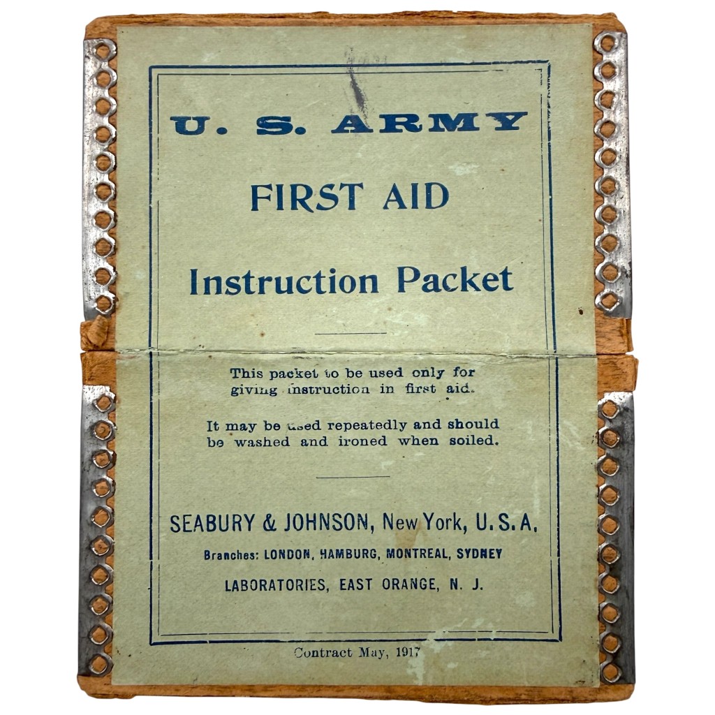 Original WW1 1917 US Army First Aid Instruction Packet by Seabury & Johnson New York for collectors of American military medical equipment.