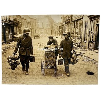 Original WWI German Army photo showing ammunition transport and Stahlhelm soldiers in devastated Lens between Lens and Arras on the Western Front.