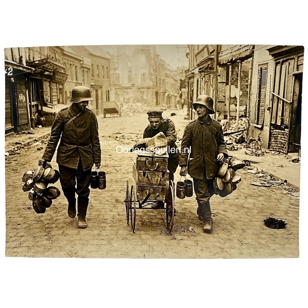 Original WWI German Army photo showing ammunition transport and Stahlhelm soldiers in devastated Lens between Lens and Arras on the Western Front.