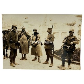 Original WWI German Army photo with German soldiers and two captured French prisoners after a patrol raid on the Western Front.