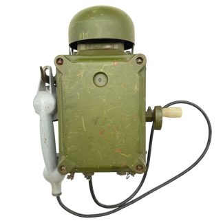 Original WWII German Siemens bunker telephone from Norway with handset, hand crank and green metal housing World War II military communications.