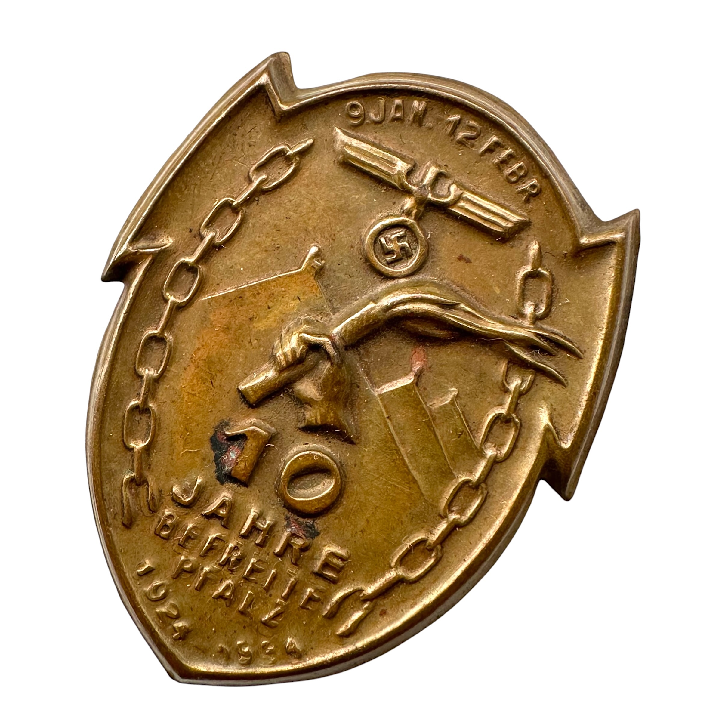 Original German 1934 '10 Jahre Befreite Pfalz' commemorative tinnie badge 1924-1934 with eagle, swastika, torch and original fastening pin.