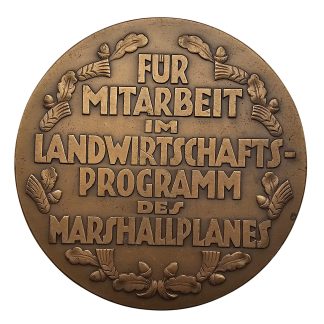 Original circa 1948-1952 German bronze Marshall Plan agricultural program cooperation plaque with detailed relief and German inscription.