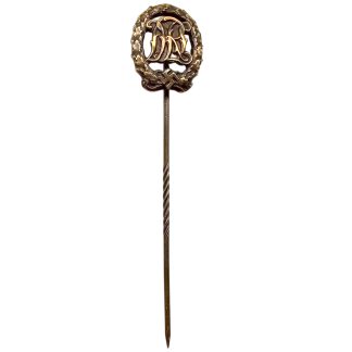 Original WWII German DRL Sportabzeichen miniature stickpin with laurel wreath, DRL monogram, swastika and long pin for militaria collectors.