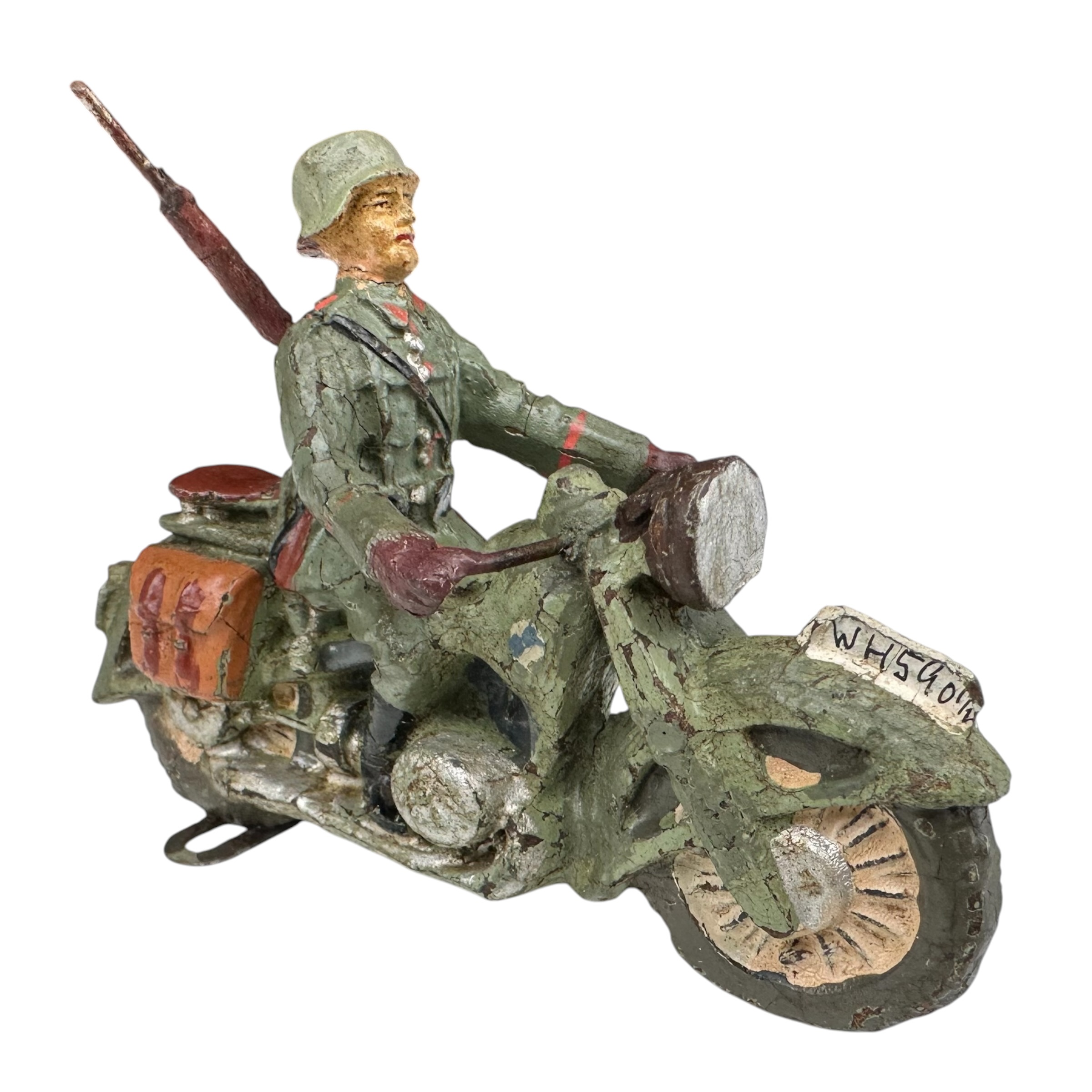 Original WWII German Elastolin Wehrmacht BMW motorcycle rider with BMW logo, rifle, luggage bags and WH 39014 registration by O. & M. Hausser.