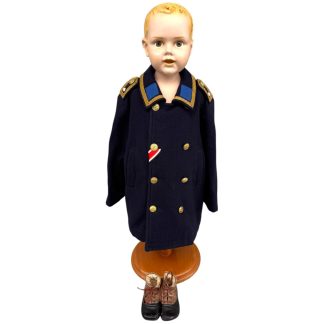 Original WWII German Kriegsmarine child Colani uniform with collar patches, anchor buttons, Iron Cross ribbon, lace-up shoes and display bust.