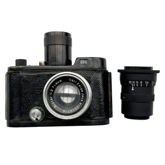 Original WWII German Luftwaffe Robot II camera with Carl Zeiss Jena Biotar 1:2 f=4cm lens, additional Schneider-Kreuznach 7.5cm telephoto lens and 'Luftwaffen-Eigentum' markings.