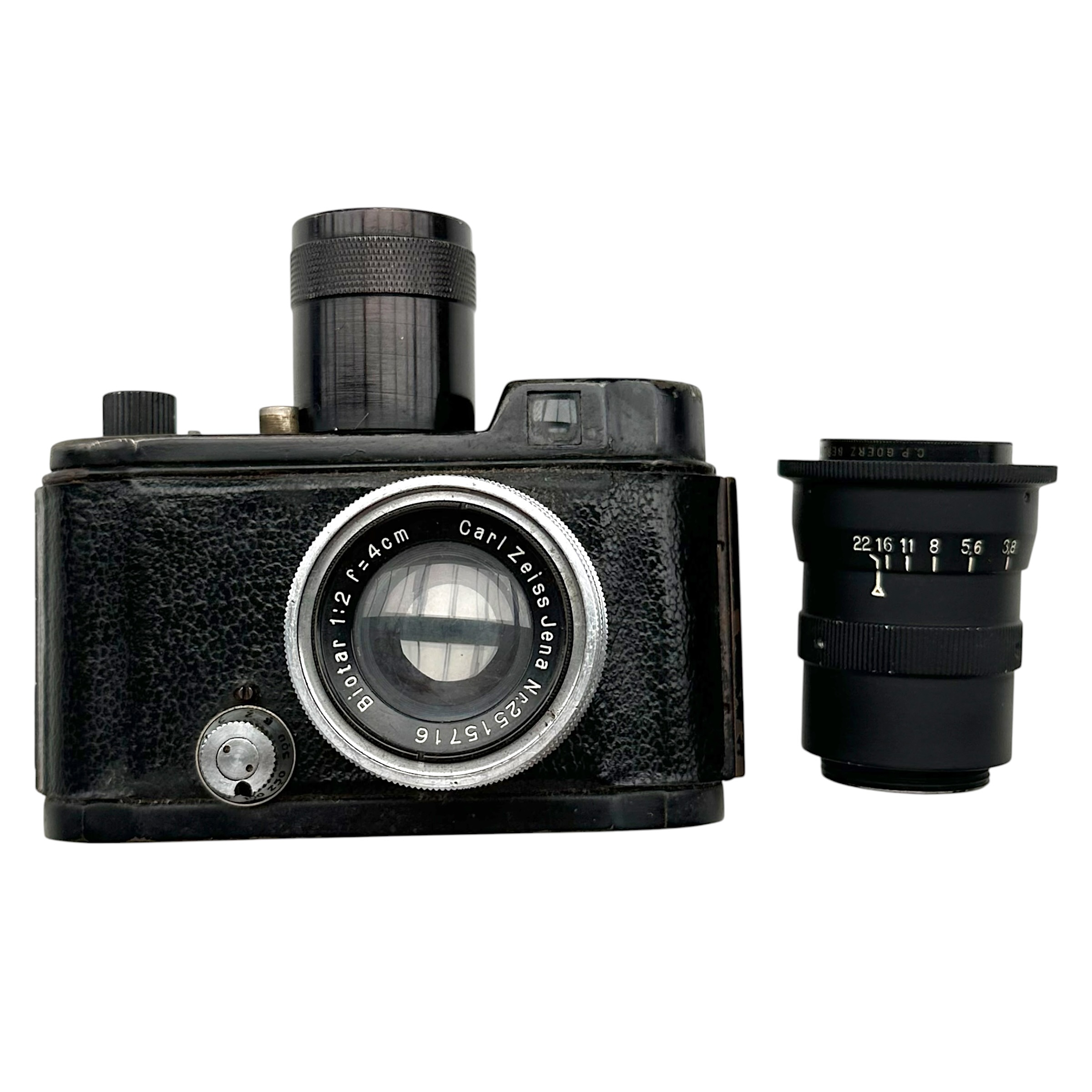 Original WWII German Luftwaffe Robot II camera with Carl Zeiss Jena Biotar 1:2 f=4cm lens, additional Schneider-Kreuznach 7.5cm telephoto lens and 'Luftwaffen-Eigentum' markings.