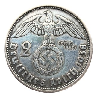 Original WWII German silver 2 Reichsmark Paul von Hindenburg coin with Reich eagle and swastika, Third Reich coin for militaria collectors.