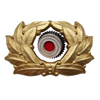 Original WWII German TENO high leader visor cap cockade with gold-coloured laurel wreath, national cockade and GES. GESCH. marking