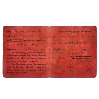 Original WWII German Feuerwehr Ausweis 1942 volunteer fire brigade Lowitsch General Government occupied Poland with stamps and signatures.