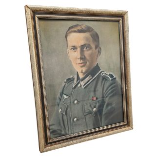 Original WWII German Wehrmacht Heer soldier colourised portrait in decorative period frame, measuring 46 x 35 cm, German military collectible.