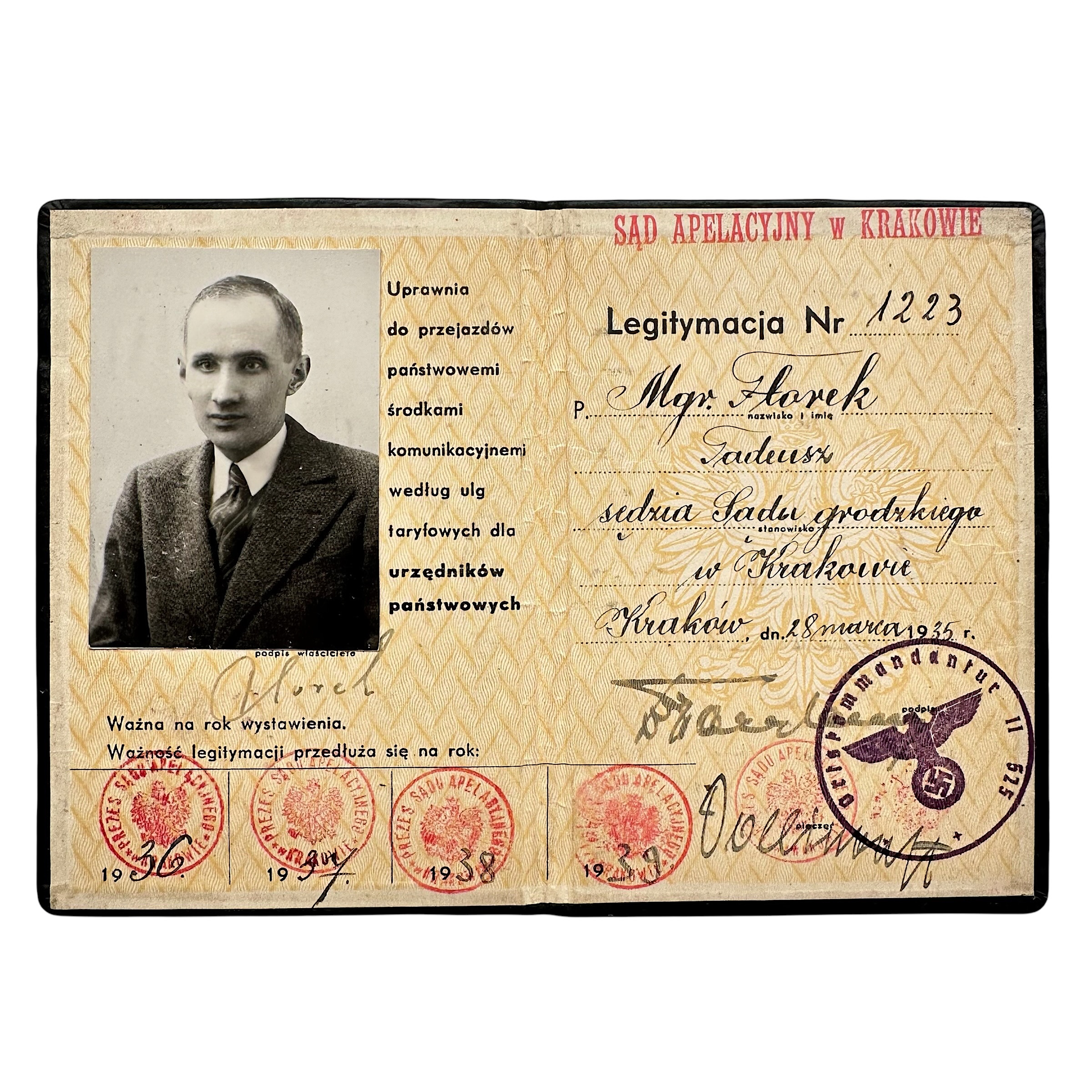 Original WWII Polish Krakow judge Tadeusz Florek ID card with portrait photo, court stamps and German Generalgouvernement occupation stamp 1943.