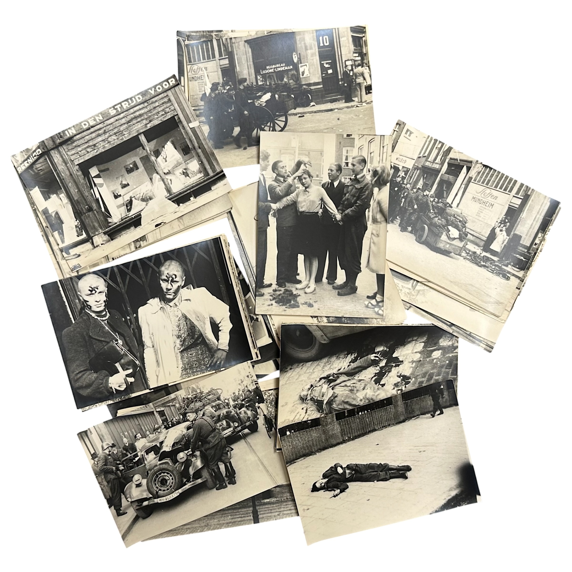 63 originele WOII foto's bevrijding Amsterdam mei 1945, schietpartij Dam 7 mei, slachtoffers, Rode Kruis, Binnenlandse Strijdkrachten, Duitse SS, Wehrmacht en arrestaties.