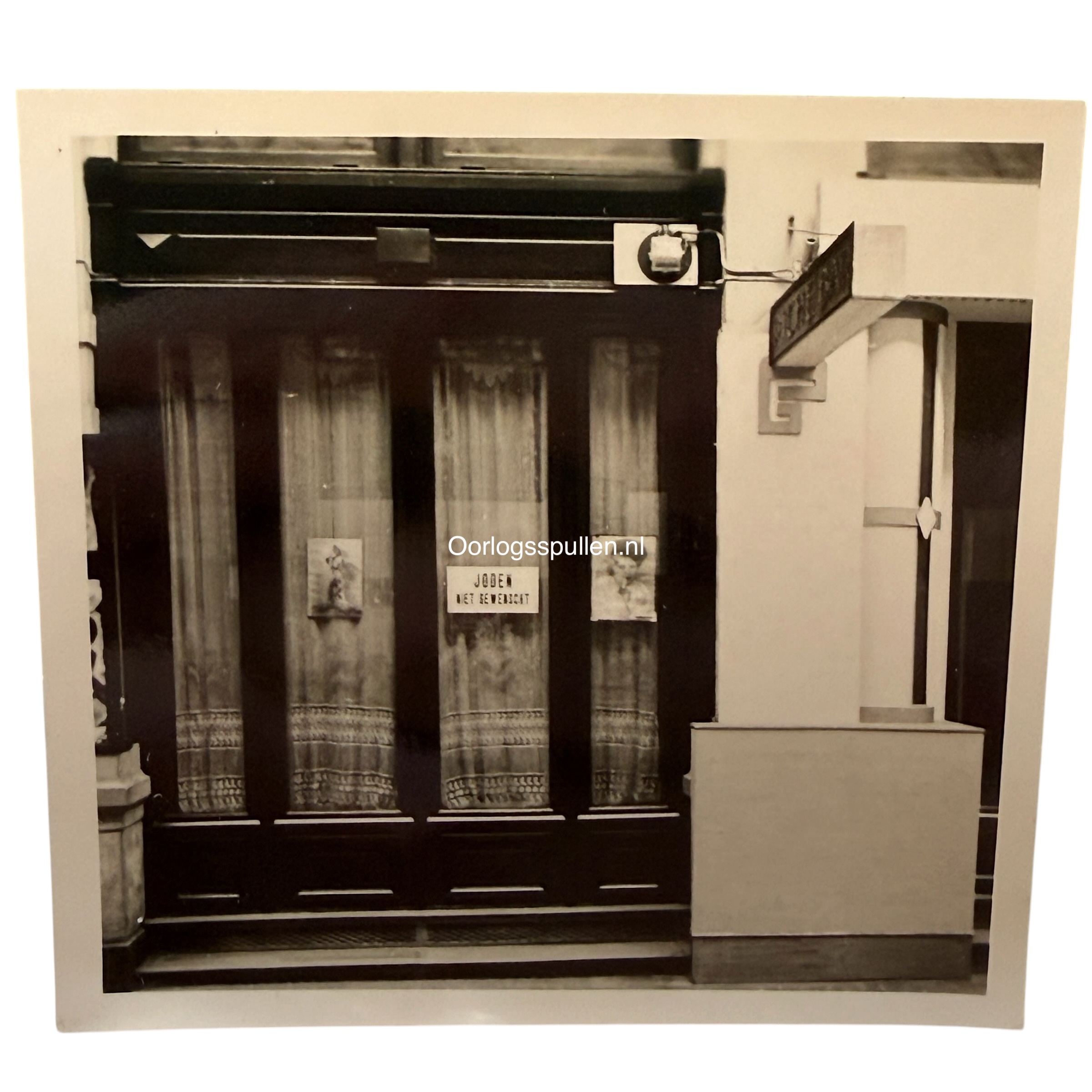 Original WWII German photo The Hague café with antisemitic 'Joden niet gewenscht' sign during the German occupation and persecution of Jews in the Netherlands